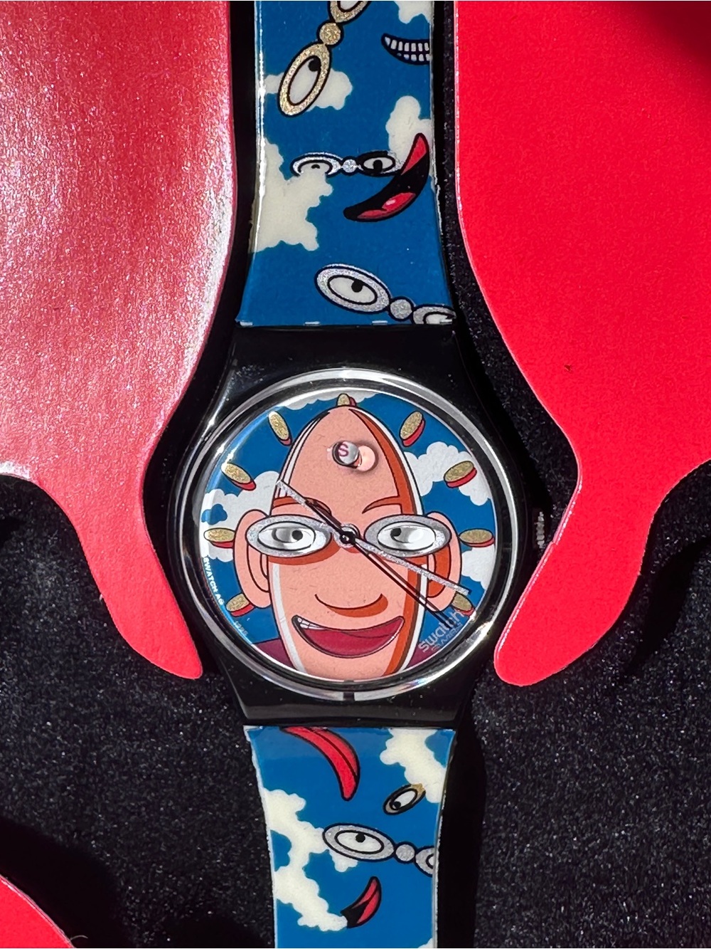 Swatch Club watch with display case and brooch